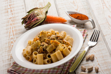 pasta with artichokes cream carrots and pistachio nuts