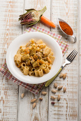 pasta with artichokes cream carrots and pistachio nuts
