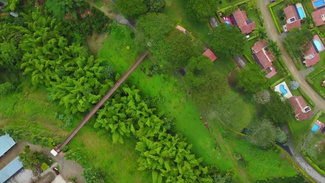 AERIAL: birds-eye view scan over a part of the precious Panaca park in Quidio, Colombia, that's been surrounded by coffee plantations.