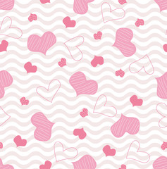 Cute girly seamless pattern with abstract hand drawn heart. Stylized love doodle textile print for Valentine's day holiday. Beautiful baby graphic fabric ornament with pink hearts and waves