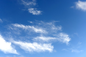 Naklejka na ściany i meble Blue Sky Background With White Clouds