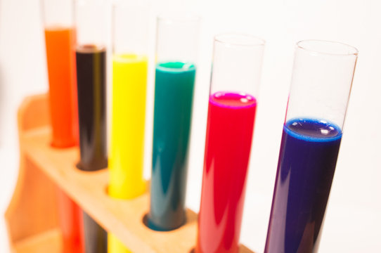 colorful test tubes filled with fluids