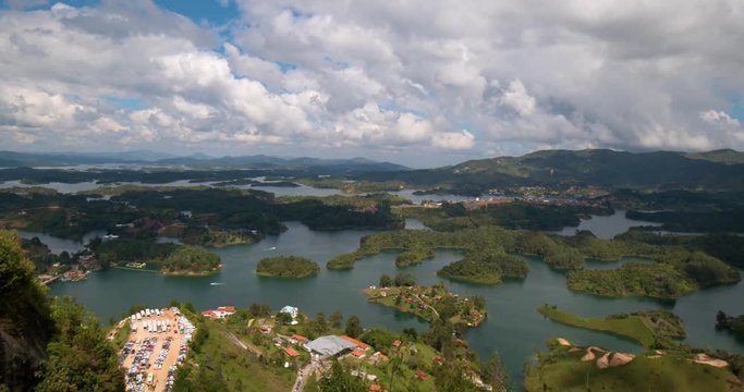 Medellin, Colombia, time hyper lapse view of Guatape village from the main attraction of the area which is the rock "Piedra del Penol" 