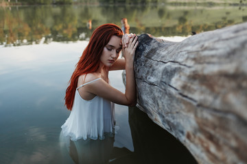  redhead girl in the lake