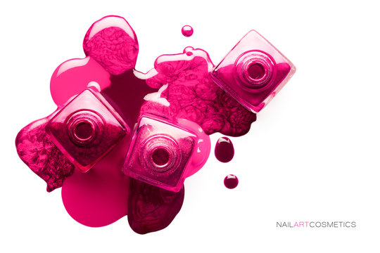 Nail art concept. Different shades of metallic pink nail polish