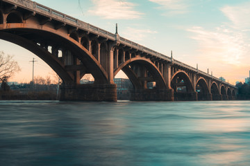 Fototapeta na wymiar Morning Bridge Over Water