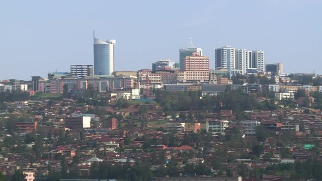 Fast Zoom in from a hill to downtown Kigali skyline - Rwanda.