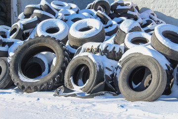 pile of snow covered tires