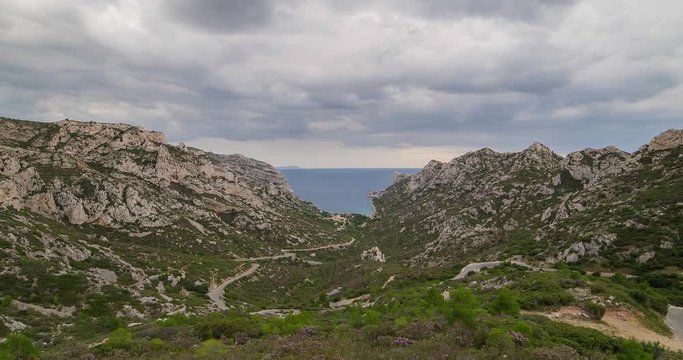 Calanque de Sormiou, marseille, France. Time hyper lapse footage 4k, clouds moving on the cliffs and seaside