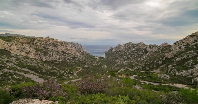 Calanque de Sormiou, marseille, France. Time hyper lapse footage 4k, clouds moving on the cliffs and seaside
