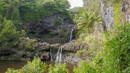 Plakat two pools and waterfalls at the famous seven sacred pools at oheo gulch