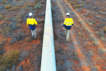 Engineers undertaking a condition assessment of an above ground water pipeline in the Australia...