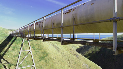 Water Pipeline on pipe bridge traversing over gully in country Australia 