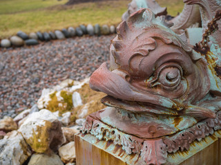empty fountain in winter, Halifax Public Gardens, closeup of lion head, no people