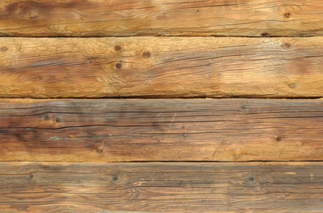 Fototapeta na wymiar Wooden wall of logs background