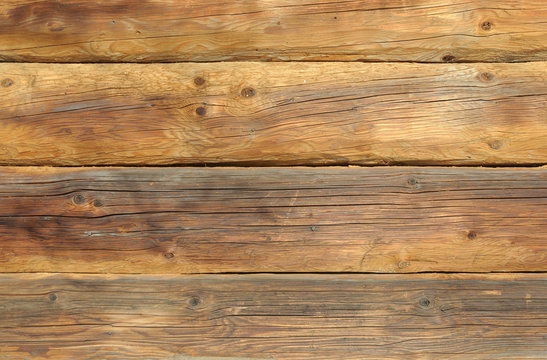 Wooden wall of logs background