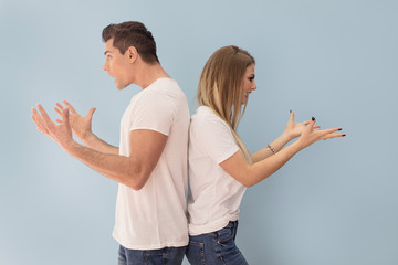 Angry young couple arguing.