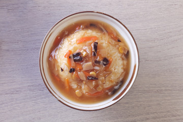 Braise rice with the mixed vegetable on the table  