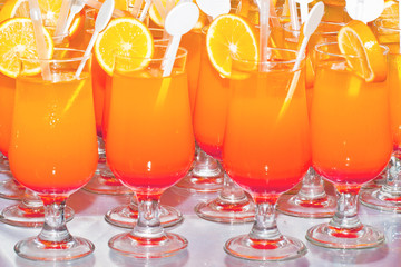 Fresh cocktail with orange, mint and ice, selective focus