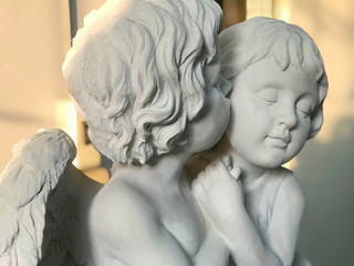 Cupids sculpture couple valentine background
