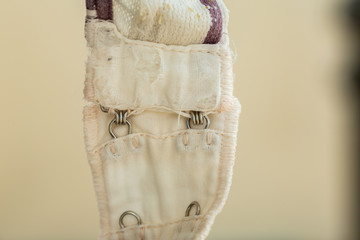 Old bra worn out and be ragged, Blurred background, Close up & Macro shot, Selective focus