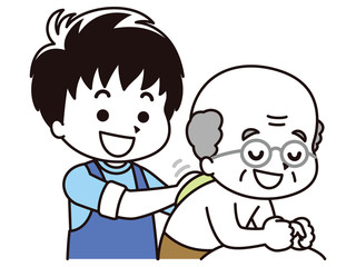 高齢男性の体を拭く男性介護士