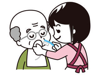 高齢男性に口腔ケアを行う女性介護士