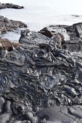 Hardened lava natural art near the water