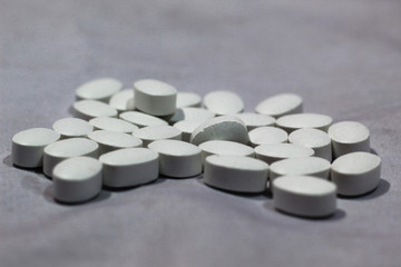 heap of tablet pill with white background