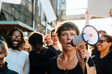 Feminist with a megaphone at a protest