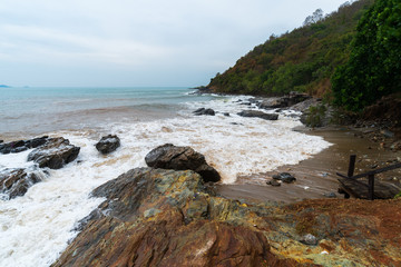 Fototapeta na wymiar sea wave with stone at Khao Laem Ya in Mu Ko Samet National Park, Rayong, Thailand