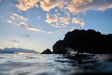 Hawaii people jumping into ocean from Black rock Ka'anapali