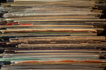 Vinyl records in a row on shelf