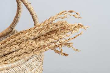 rice in basketry isolated on gray background. concept for traditional hand craft