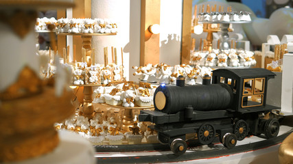 Decoration with a little train carrying candy