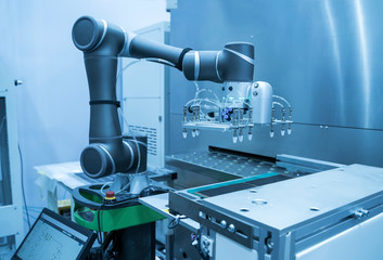Automation of machine assembly of computer circuit board with robot arm,Smart factory industry 4.0...