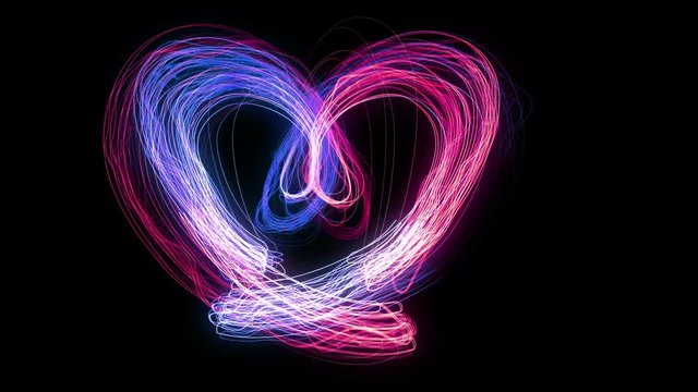 Romantic Pink Love Heart colorful animation loop.Light painting of romantic Love Heart colorful wedding background.