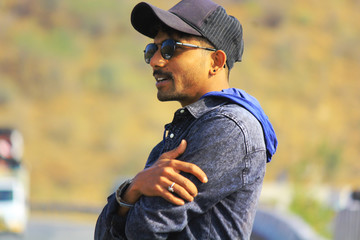 model in cap and glassess