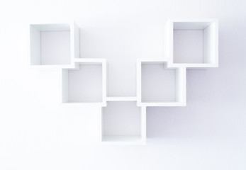 Empty modern bookshelf of white color on a white wall. Minimalism style.