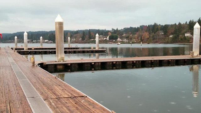 Footage on a floating dock overlooking the water in silverdale washington