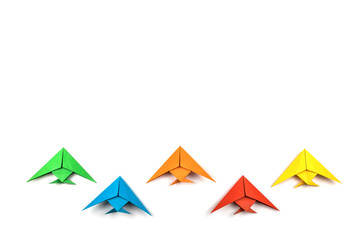 Paper origami fishes isolated on white background.