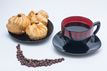 black coffee in a cup on a saucer