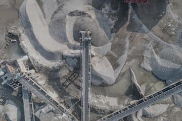 Aerial view of crushed stone quarry machine in a construction material factory 