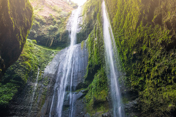 Fototapeta na wymiar Beautiful view of Madakaripura waterfalls the tallest waterfalls in Java island and second tallest waterfalls in Indonesia.
