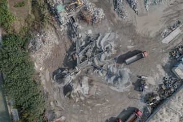 Aerial view of crushed stone quarry machine in a construction material factory 
