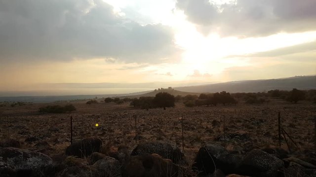 Beautiful Sunset on Huge Valley whit Trees And Big Lake and Mountains.