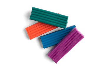 Fototapeta premium Colored plasticine isolated on white background. 