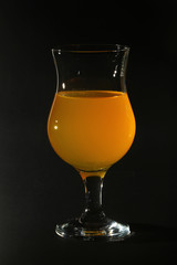 Orange drink in a cocktail glass
