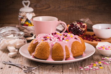 Cake with pink frosting.