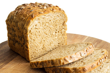 Rye bread on a white background. Rye bread with sunflower seeds. Close-up.